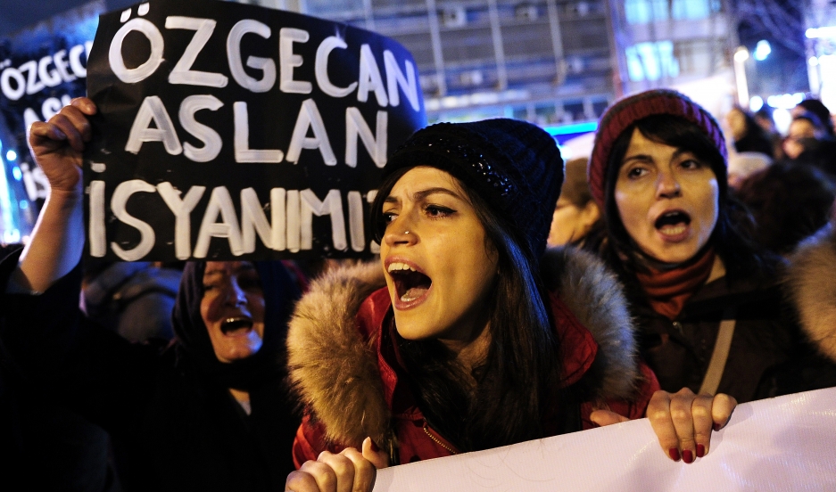 A woman shouts slogans during a demostration in Istanbul against the murder of a young woman named Özgecan Aslan. A woman shouts slogans during a demostration in Istanbul against the murder of a young woman named Özgecan Aslan.